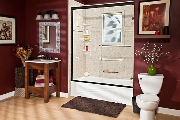 Brecchia windmill wall surround tub with oil-rubbed bronze fixtures