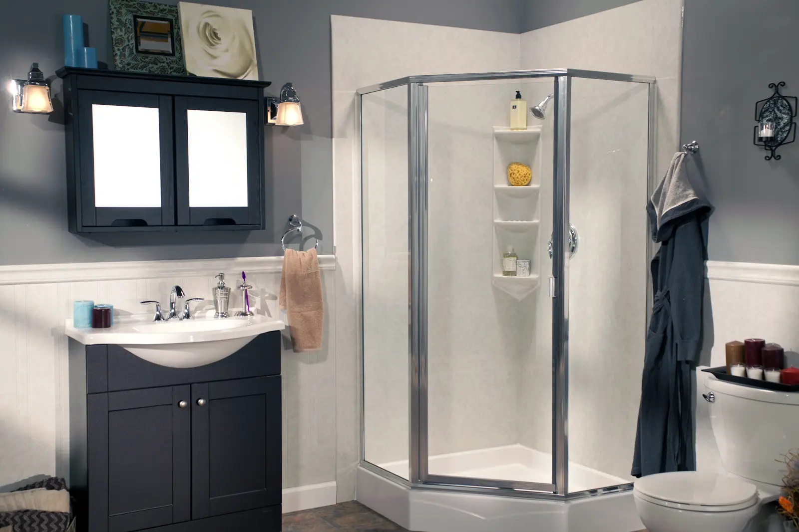 Neo-angle shower with roman stone smooth walls, wainscoting, and polished chrome